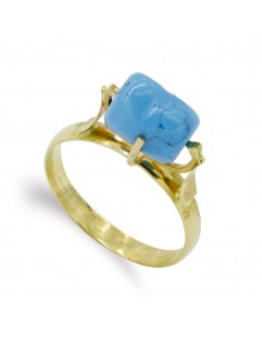 18K SORTIJA ORO AMARILLO GARRAS CON TURQUESA DE 9X7 MM.